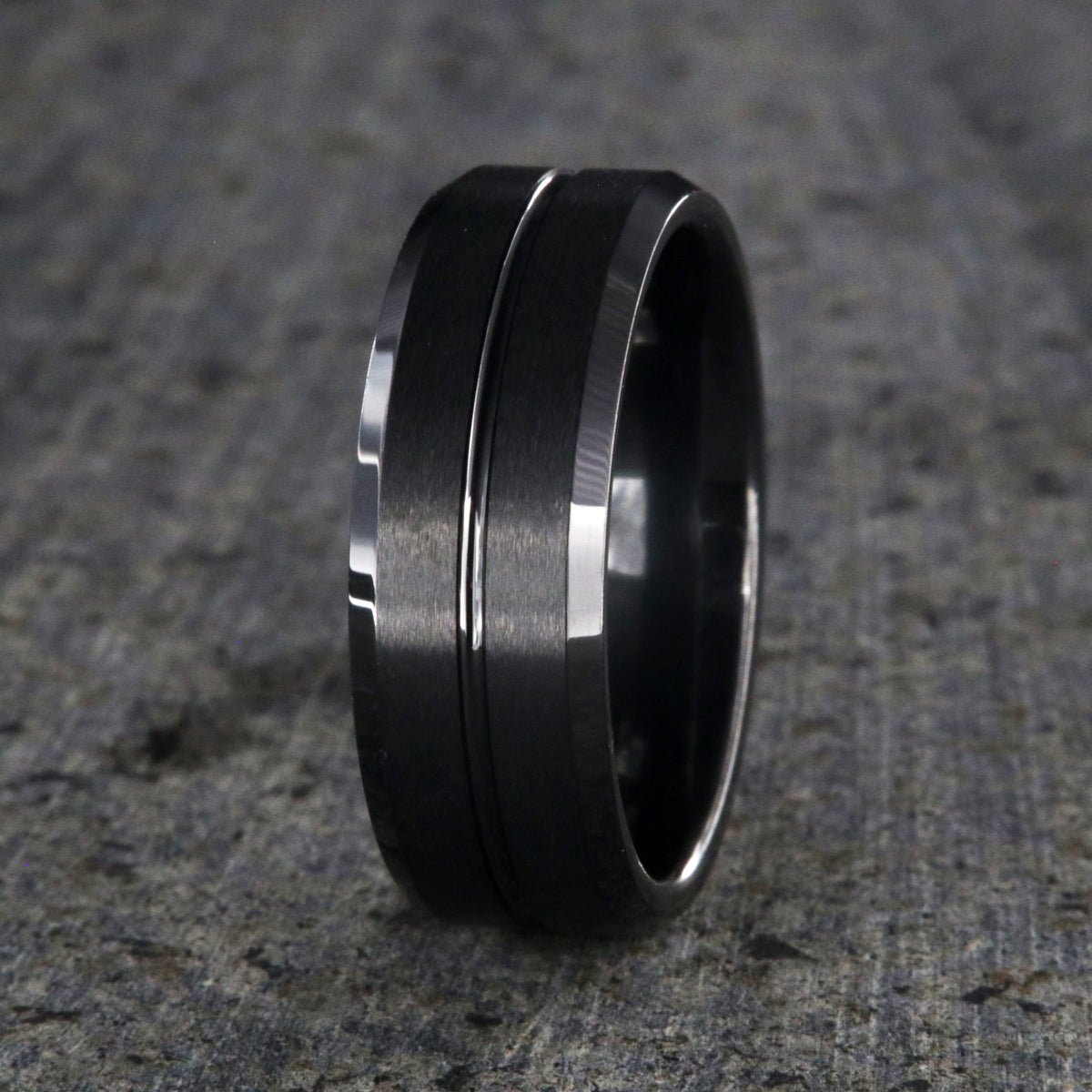 8mm wide black ceramic ring with beveled edges, a polished center groove, and a matte finish