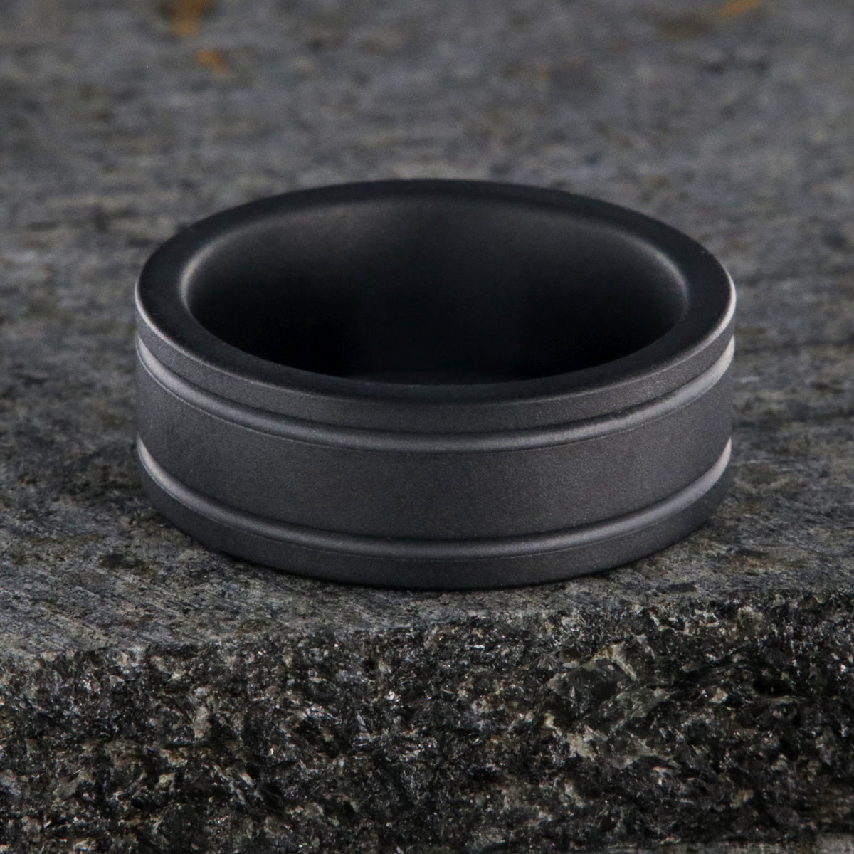 8mm wide black ceramic ring with dual edge grooves and a non-reflective finish