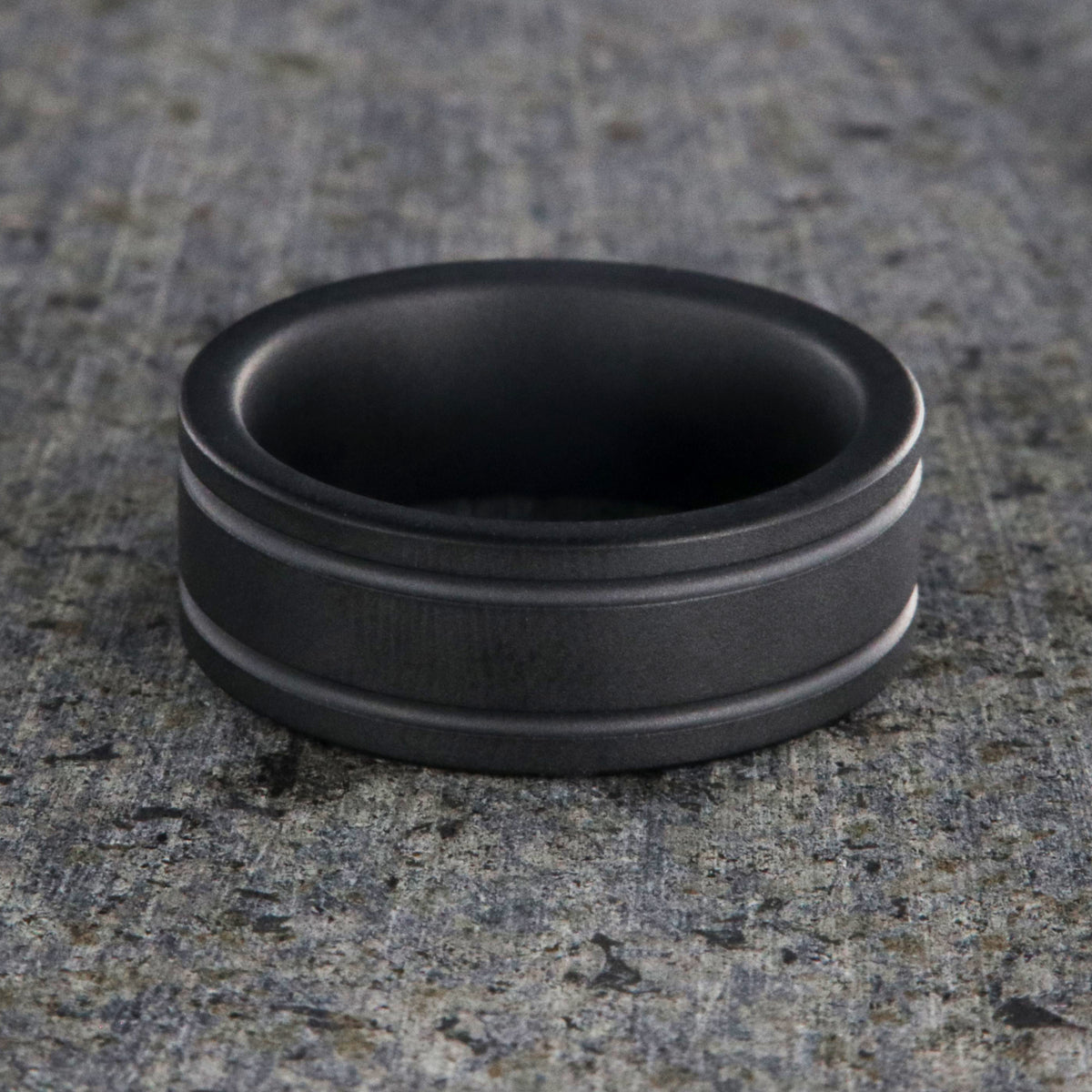 8mm wide black ceramic ring with dual edge grooves and a non-reflective finish