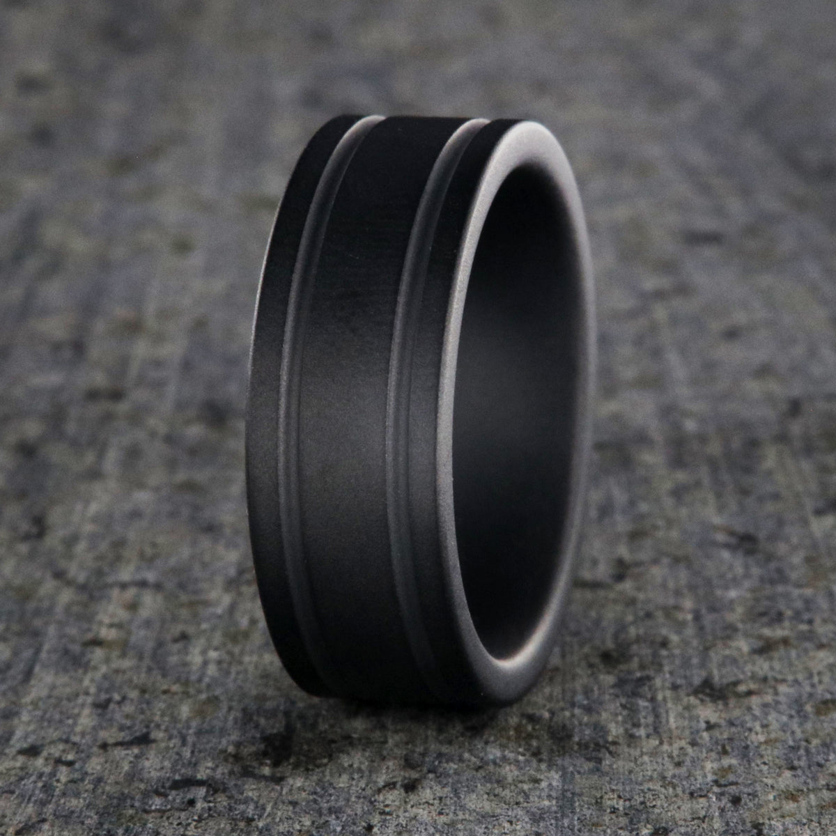 8mm wide black ceramic ring with dual edge grooves and a non-reflective finish
