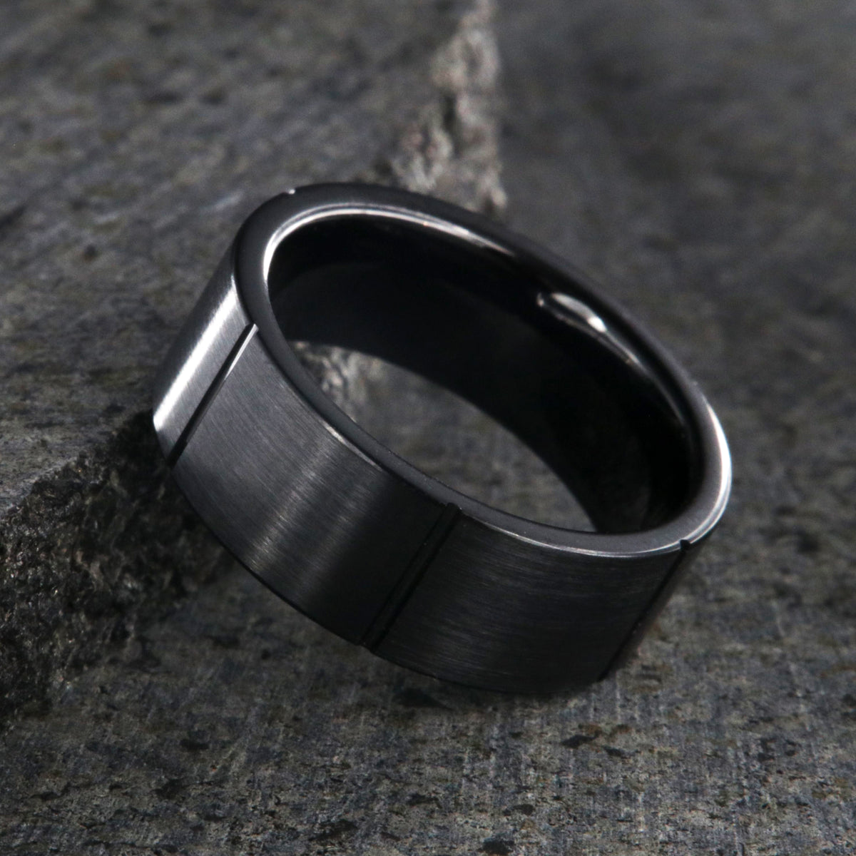8mm wide black ceramic ring with a matte finish and vertical grooves