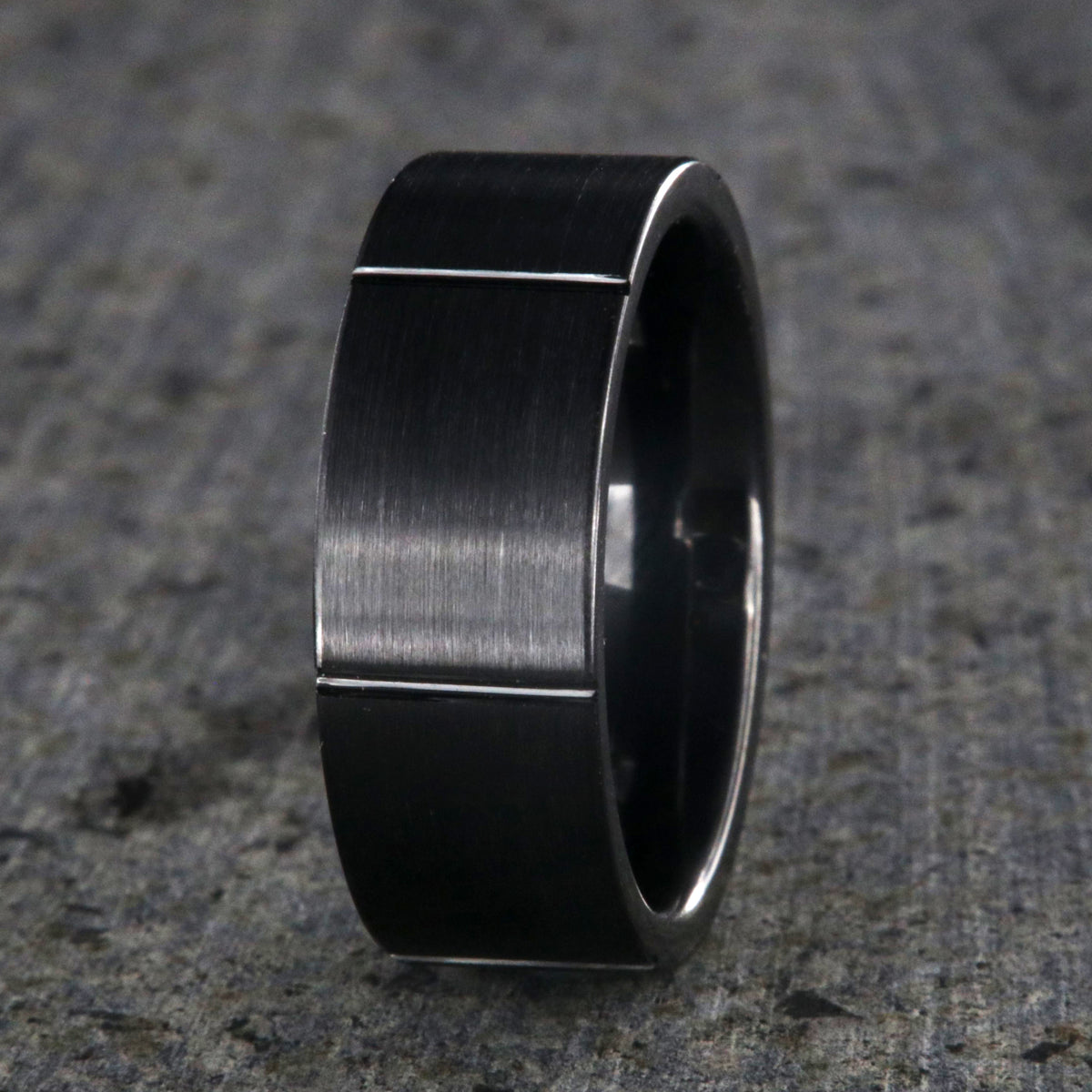 8mm wide black ceramic ring with a matte finish and vertical grooves