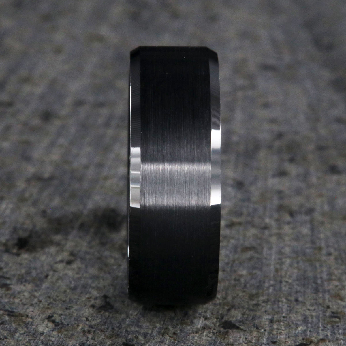 8mm wide black ceramic ring with beveled edges and a brushed finish center