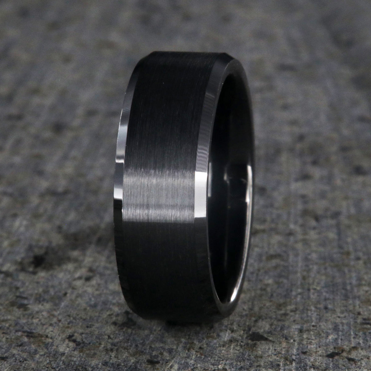8mm wide black ceramic ring with beveled edges and a brushed finish center