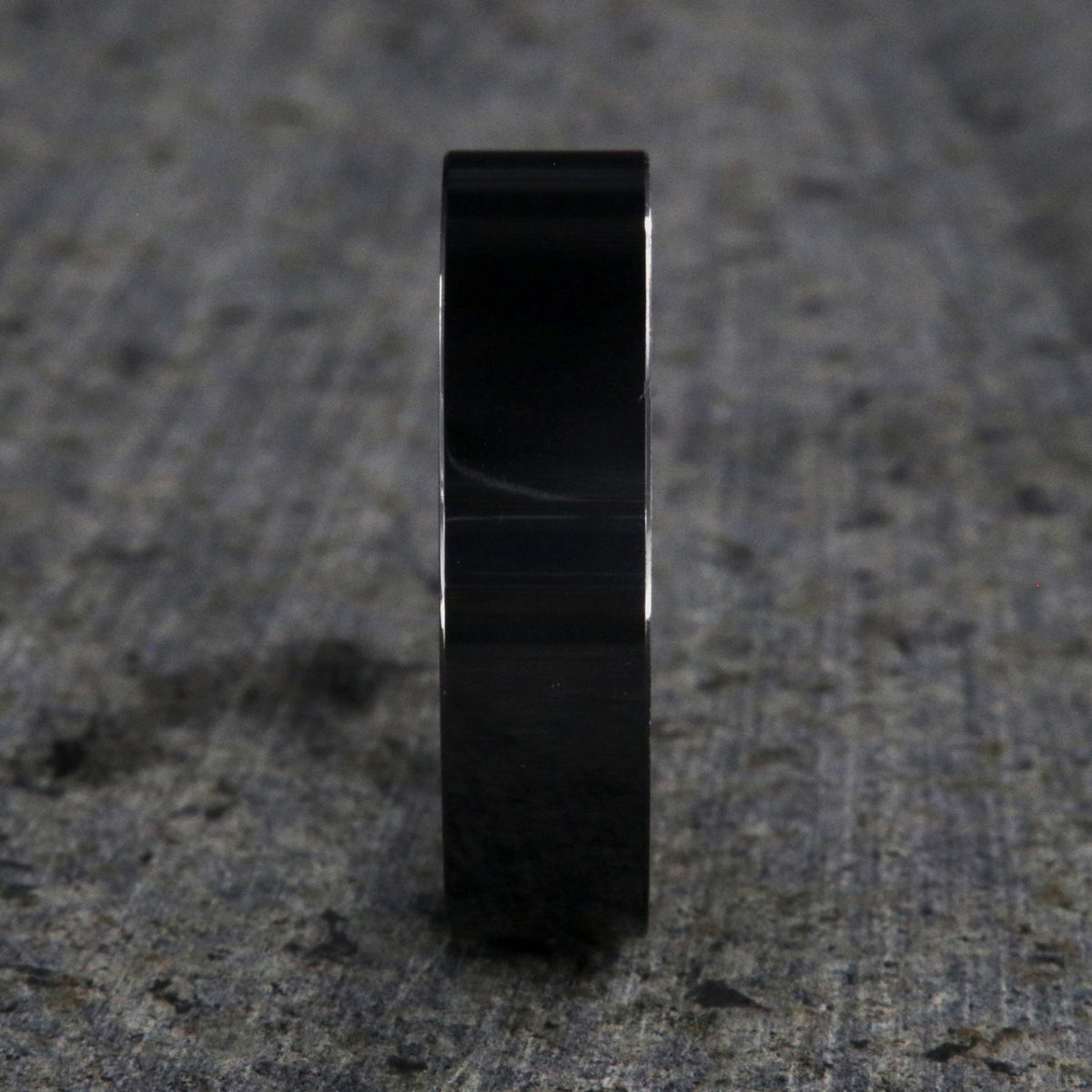 6mm wide black ceramic ring with a flat profile and polish finish