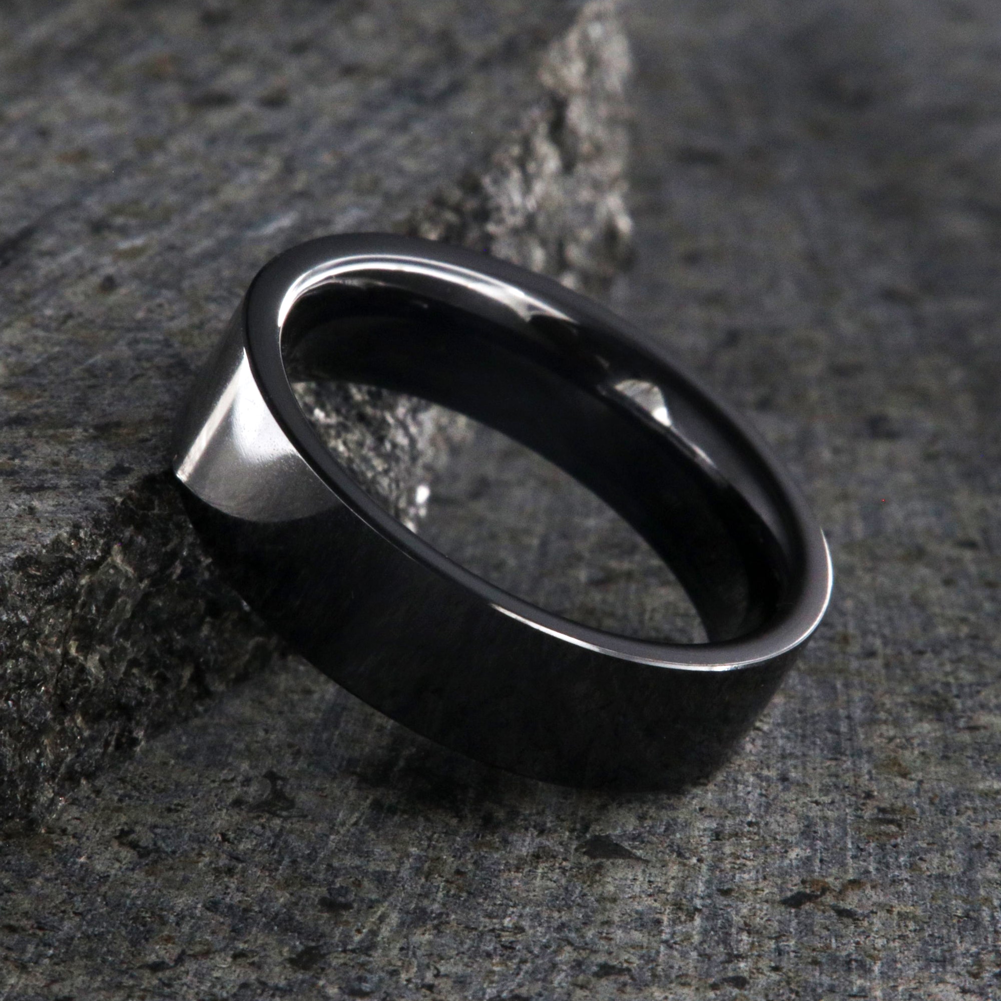 6mm wide black ceramic ring with a flat profile and polish finish