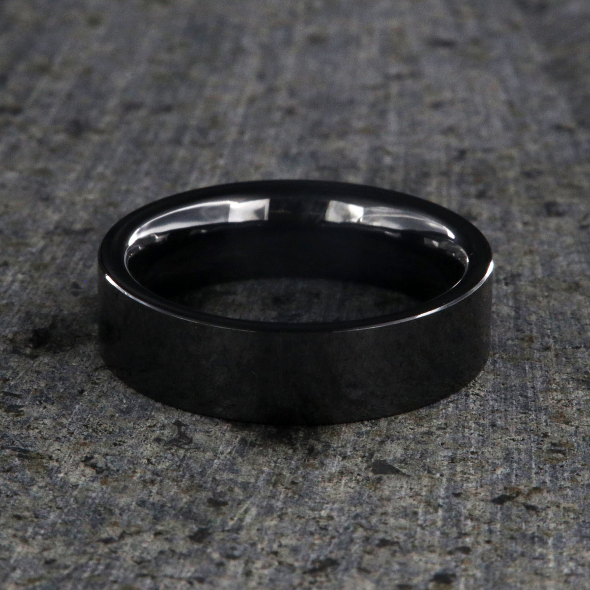 6mm wide black ceramic ring with a flat profile and polish finish