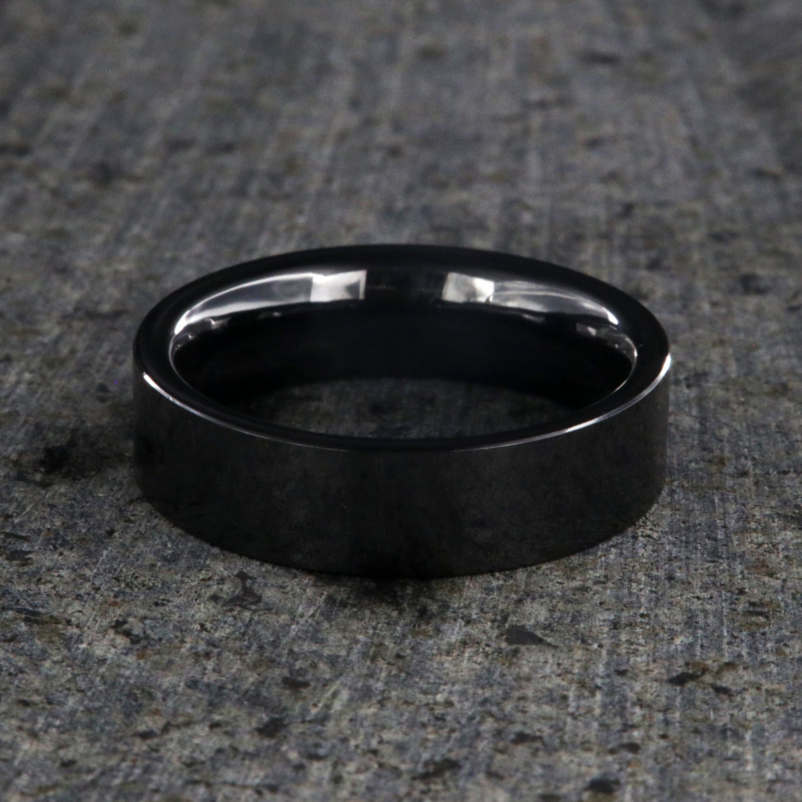 6mm wide black ceramic ring with a flat profile and polish finish