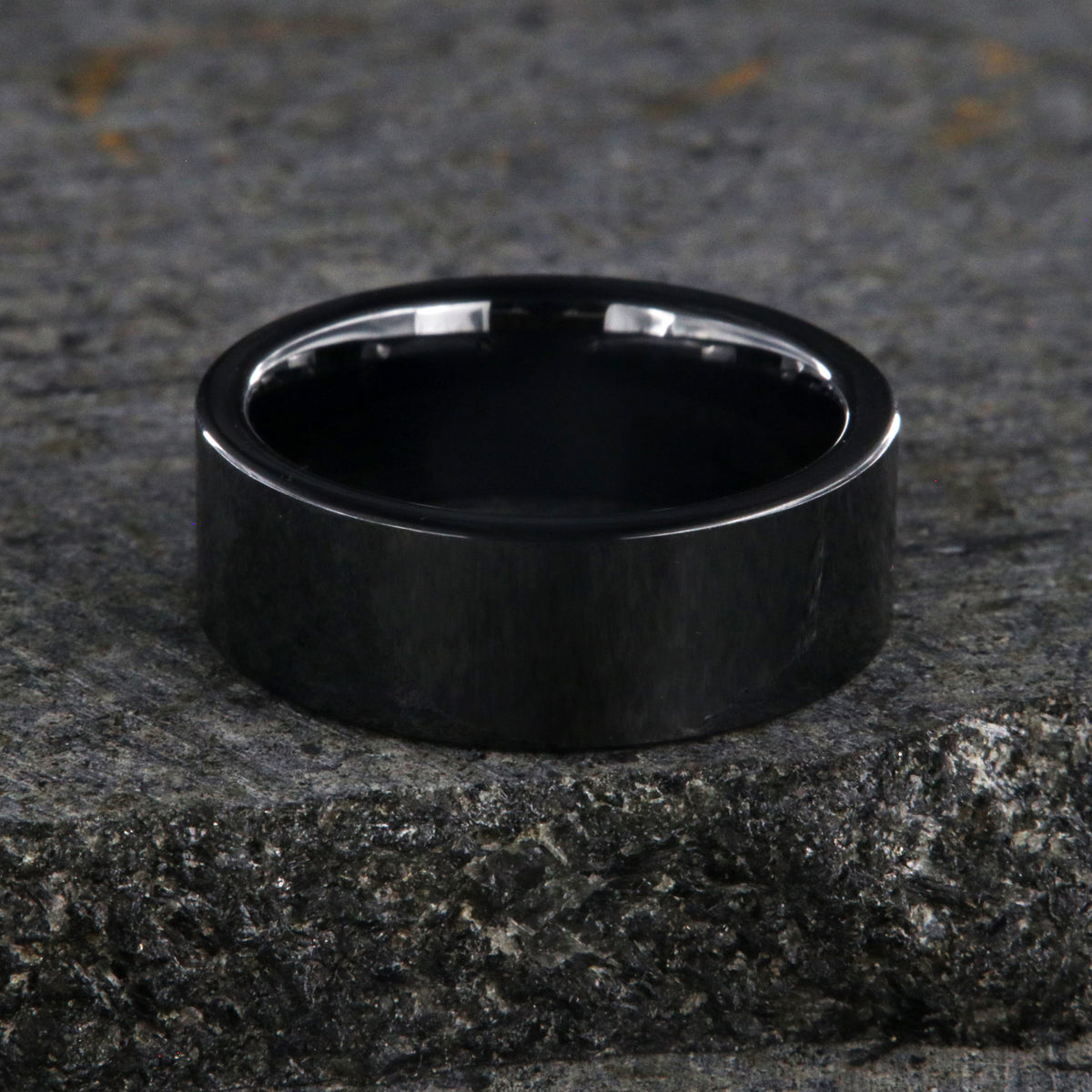 8mm wide black ceramic wedding band with a flat profile and polish finish