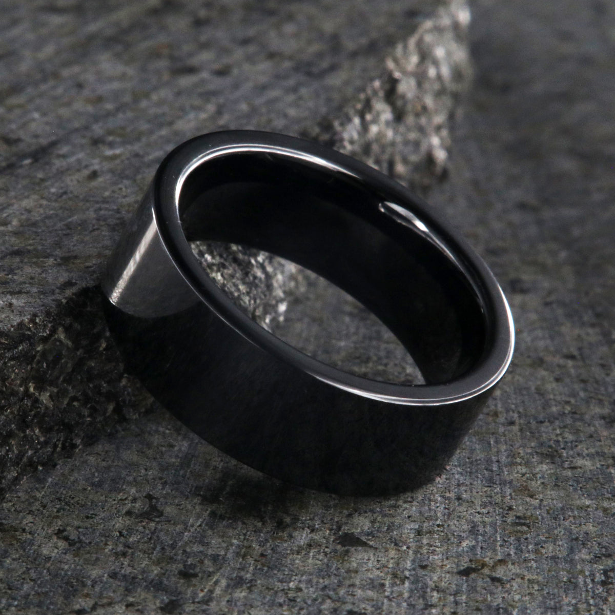 8mm wide black ceramic wedding band with a flat profile and polish finish