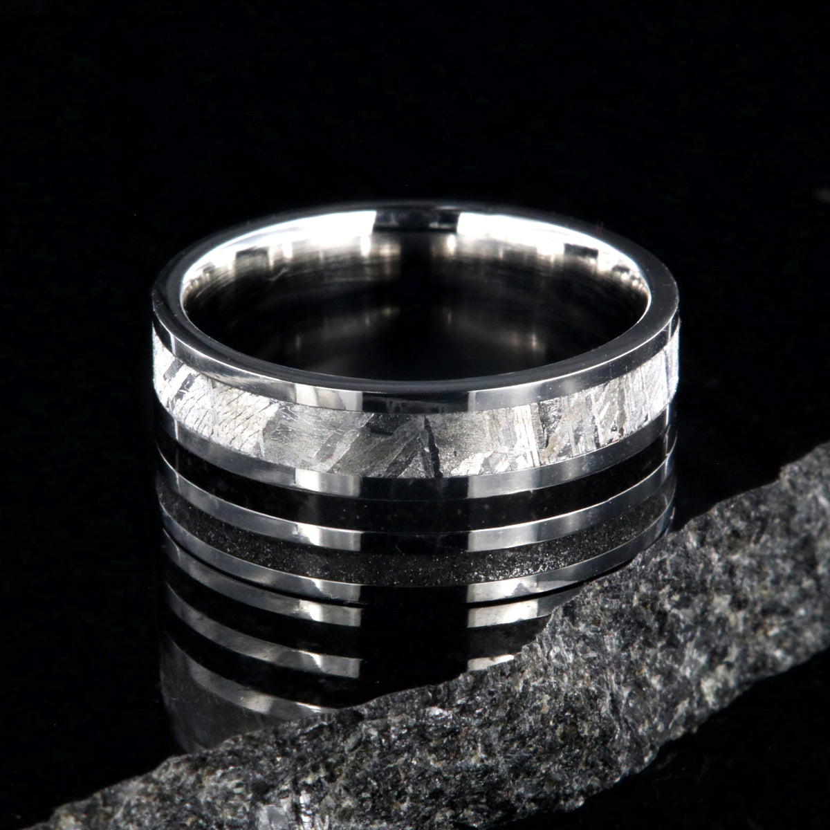 10mm wide meteorite ring with 3mm meteorite inly with 1.5mm dinosaur bone inlay, 1.5mm stardust inlay and cobalt sleeve