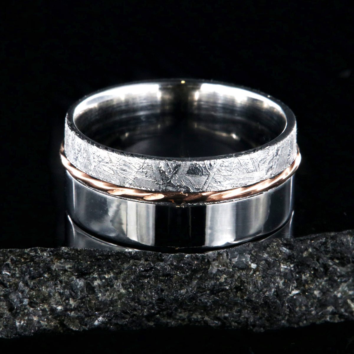 10mm wide wedding band with a wide polished cobalt edge, a centered twisted rose gold inlay, and narrow Gibeon meteorite edge