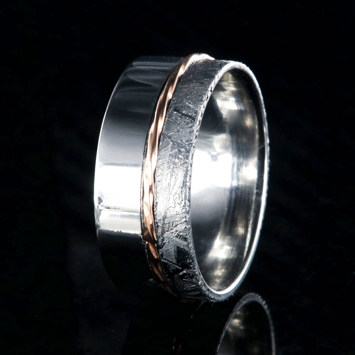 10mm wide wedding band with a wide polished cobalt edge, a centered twisted rose gold inlay, and narrow Gibeon meteorite edge