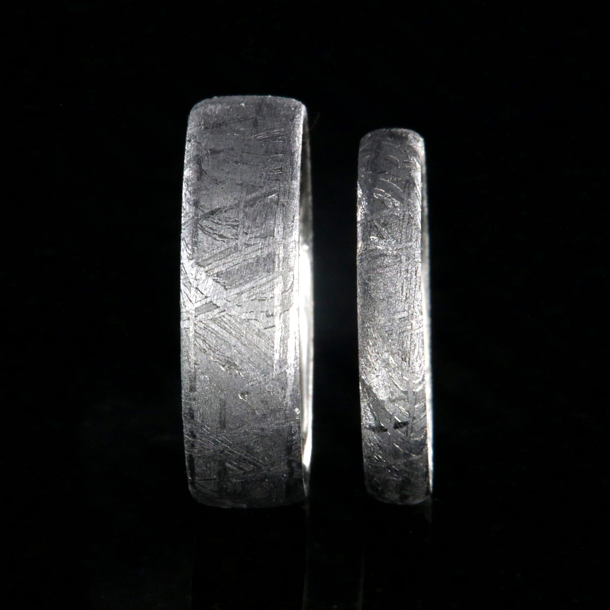 His and her ring set with 6mm wide Gibeon meteorite band and matching 3mm wide meteorite band