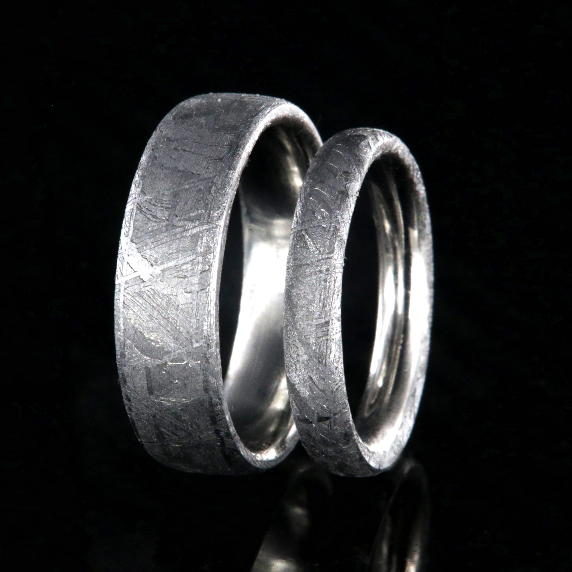 His and her ring set with 6mm wide Gibeon meteorite band and matching 3mm wide meteorite band