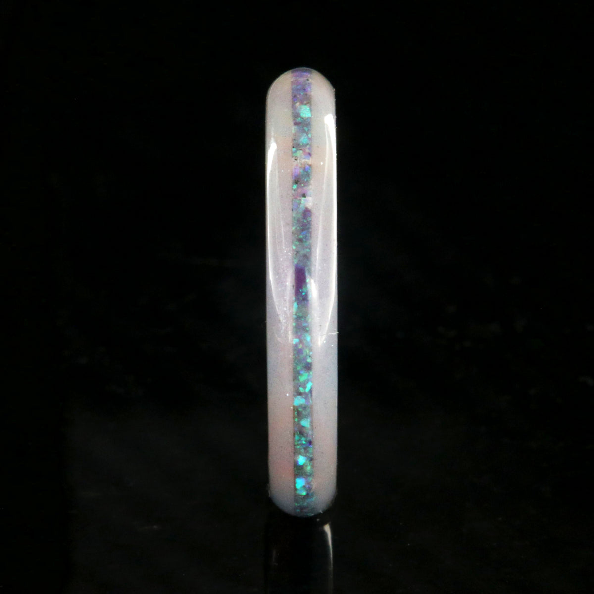 4mm wide promise ring with glittering rainbow edges and a crushed opal inlay
