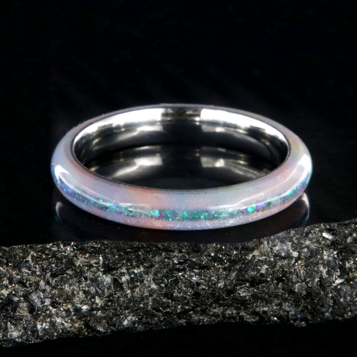 4mm wide promise ring with glittering rainbow edges and a crushed opal inlay