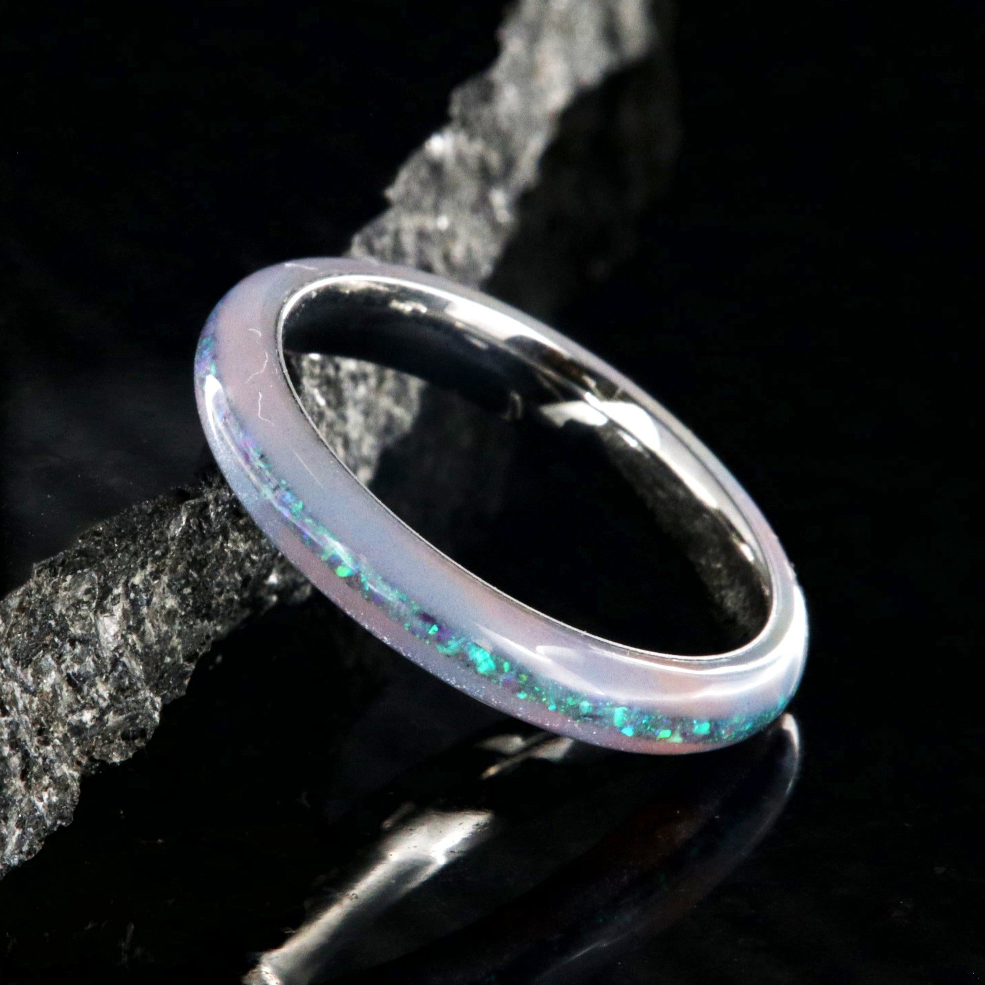 4mm wide promise ring with glittering rainbow edges and a crushed opal inlay