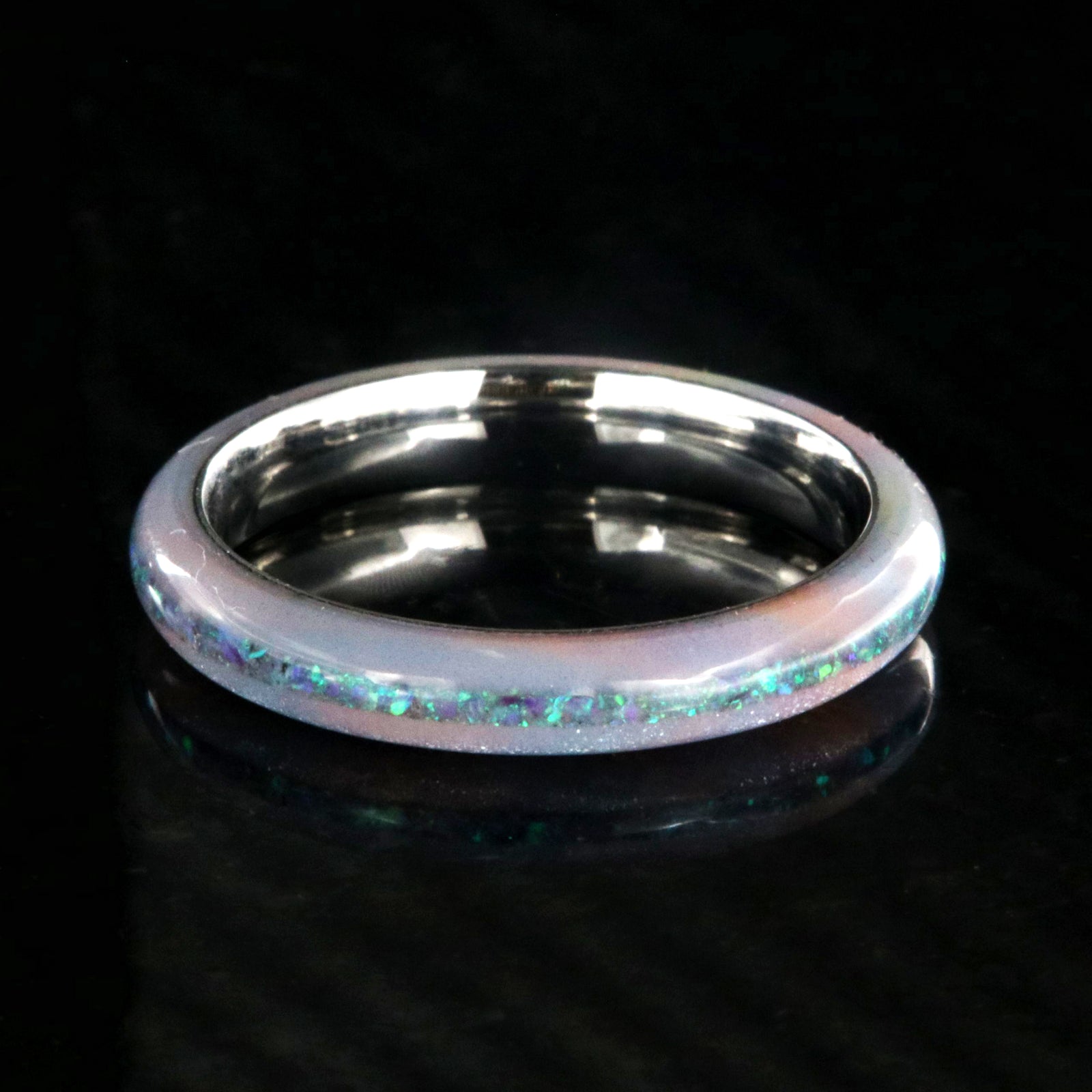 4mm wide promise ring with glittering rainbow edges and a crushed opal inlay