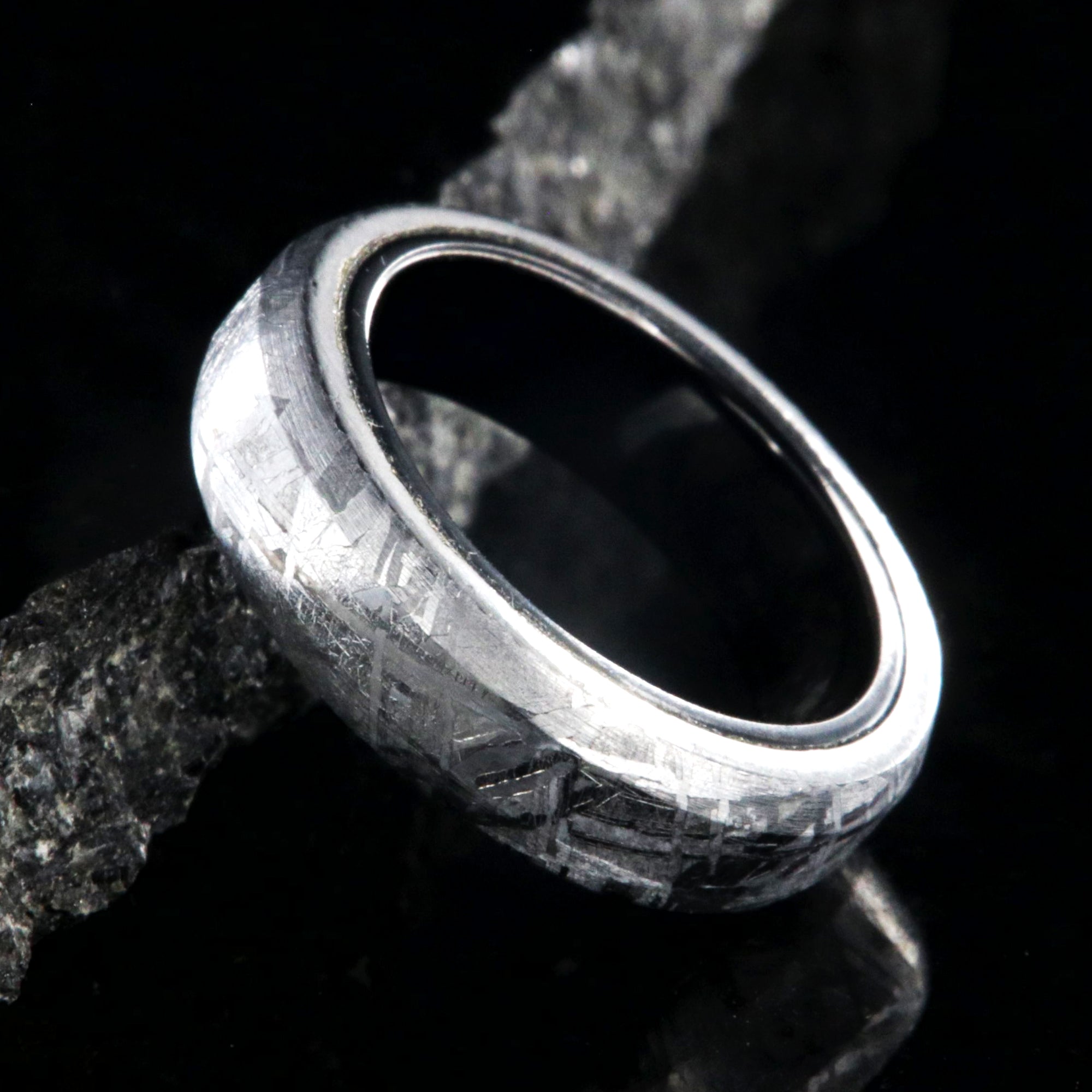 5mm wide meteorite wedding band with black titanium sleeve and beveled edges