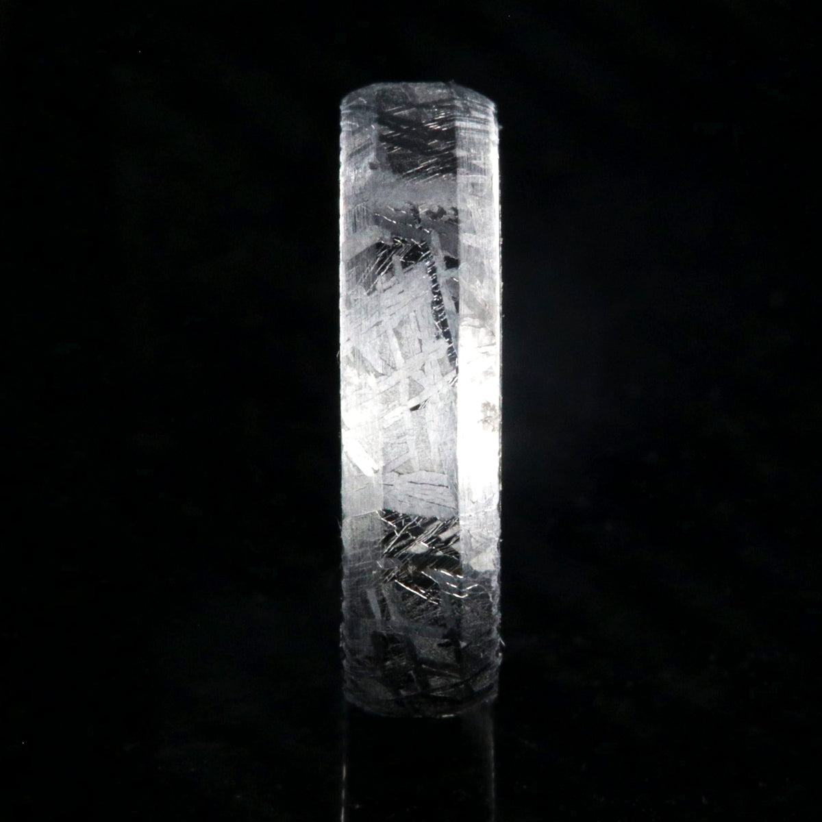 5mm wide meteorite wedding band with black titanium sleeve and beveled edges