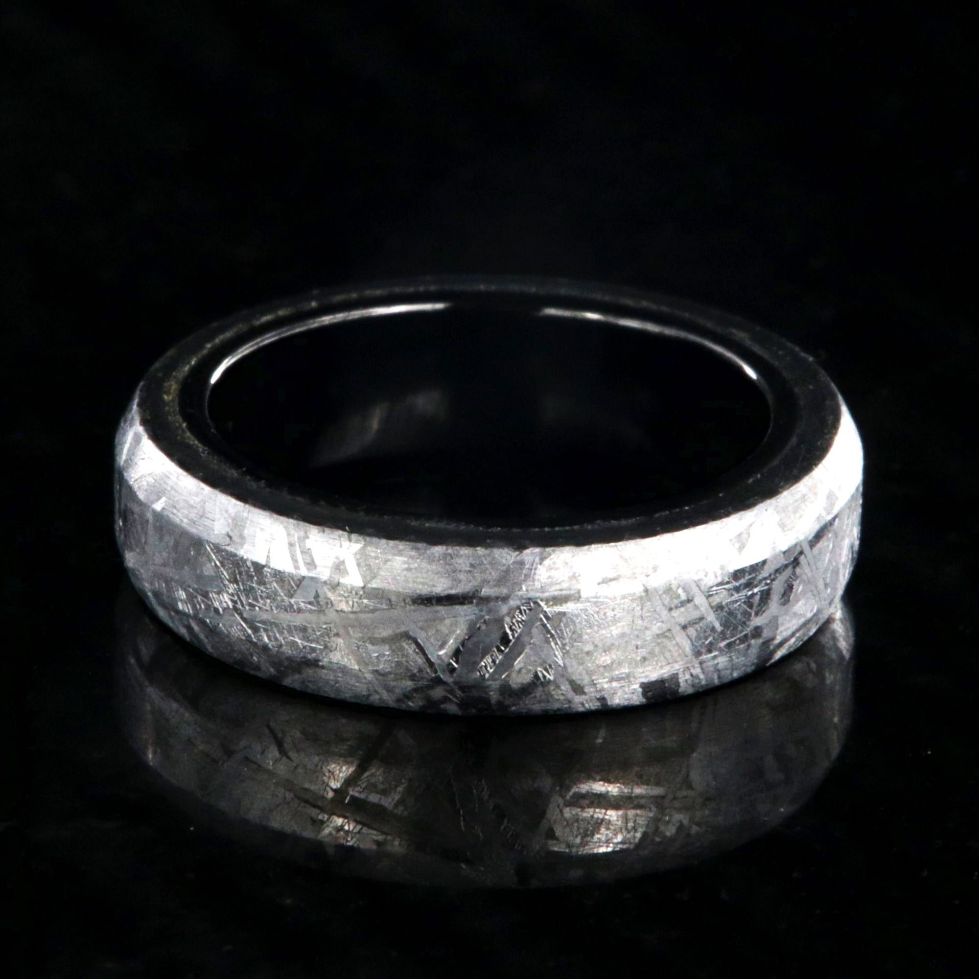 5mm wide meteorite wedding band with black titanium sleeve and beveled edges