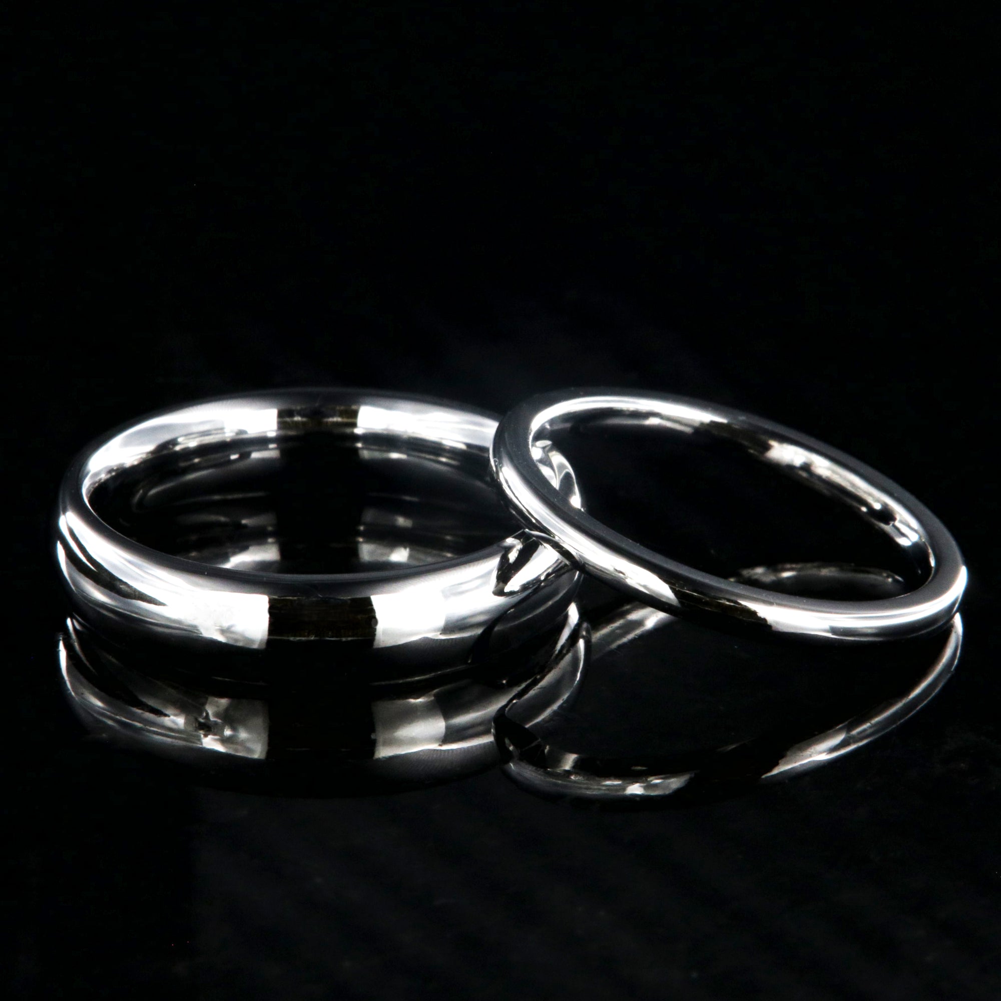 5mm and 2mm wide matching cobalt wedding bands with a polish finish and rounded profile