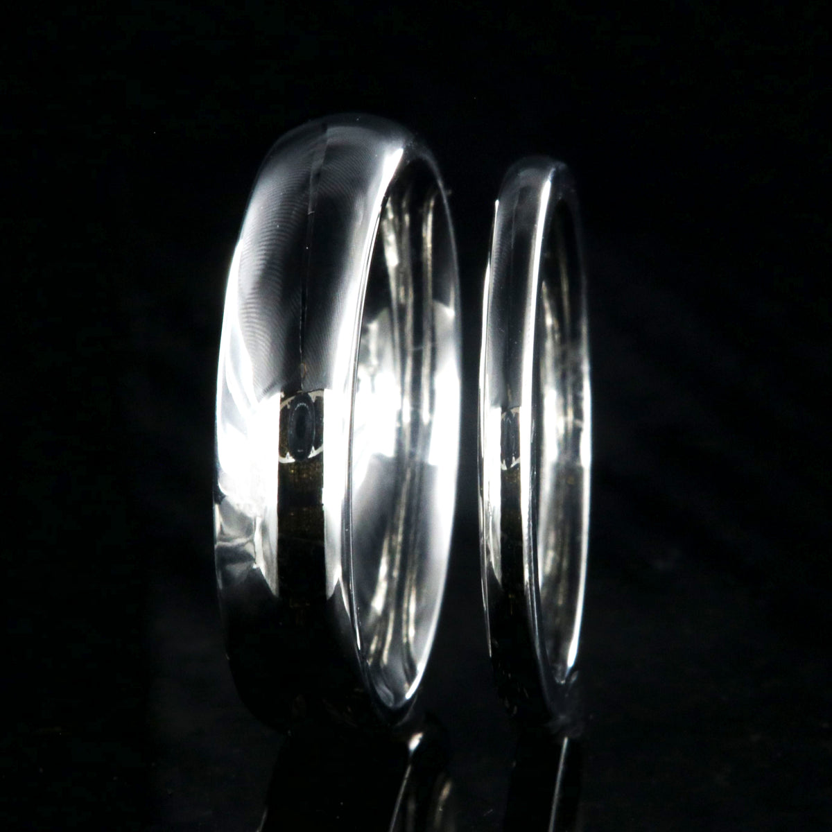 5mm and 2mm wide matching cobalt wedding bands with a polish finish and rounded profile