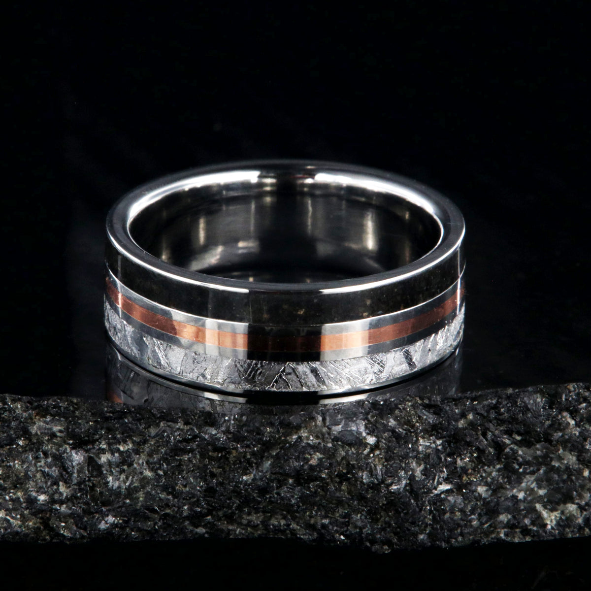 7mm wide cobalt ring with dinosaur bone fossil, copper, and Gibeone meteorite inlays