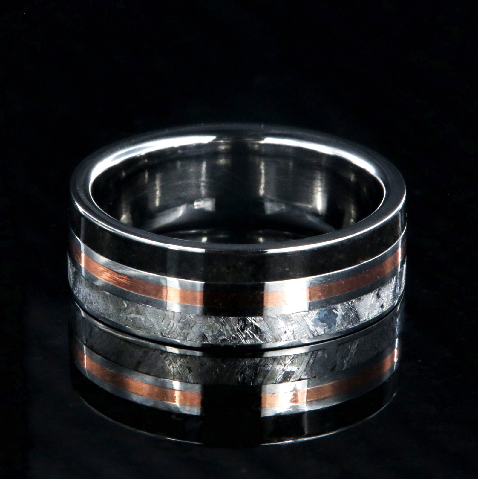 7mm wide cobalt ring with dinosaur bone fossil, copper, and Gibeone meteorite inlays