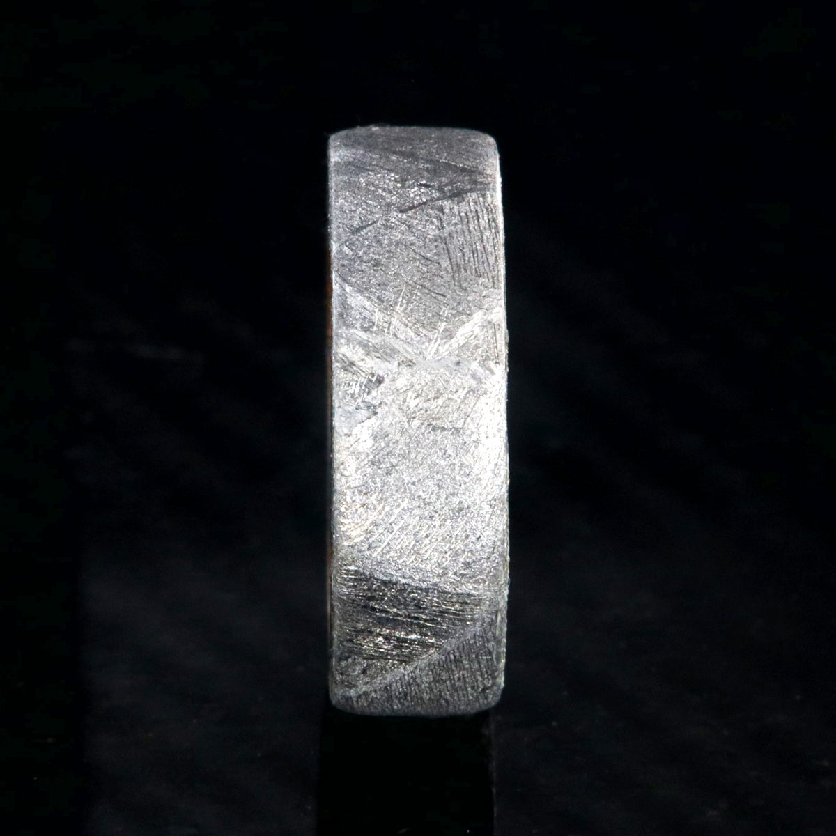 7mm wide men&#39;s wedding band with Gibeon meteorite outside and smooth Arizona ironwood sleeve