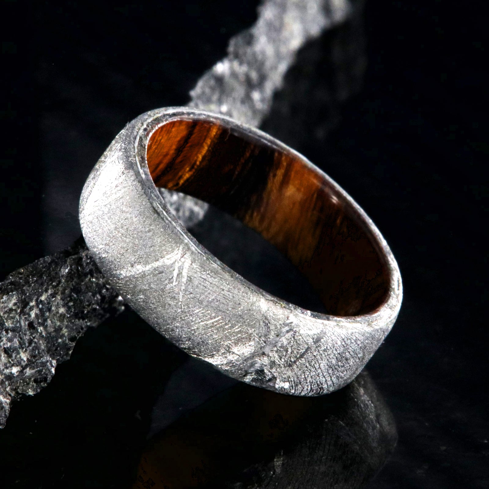7mm wide men's wedding band with Gibeon meteorite outside and smooth Arizona ironwood sleeve