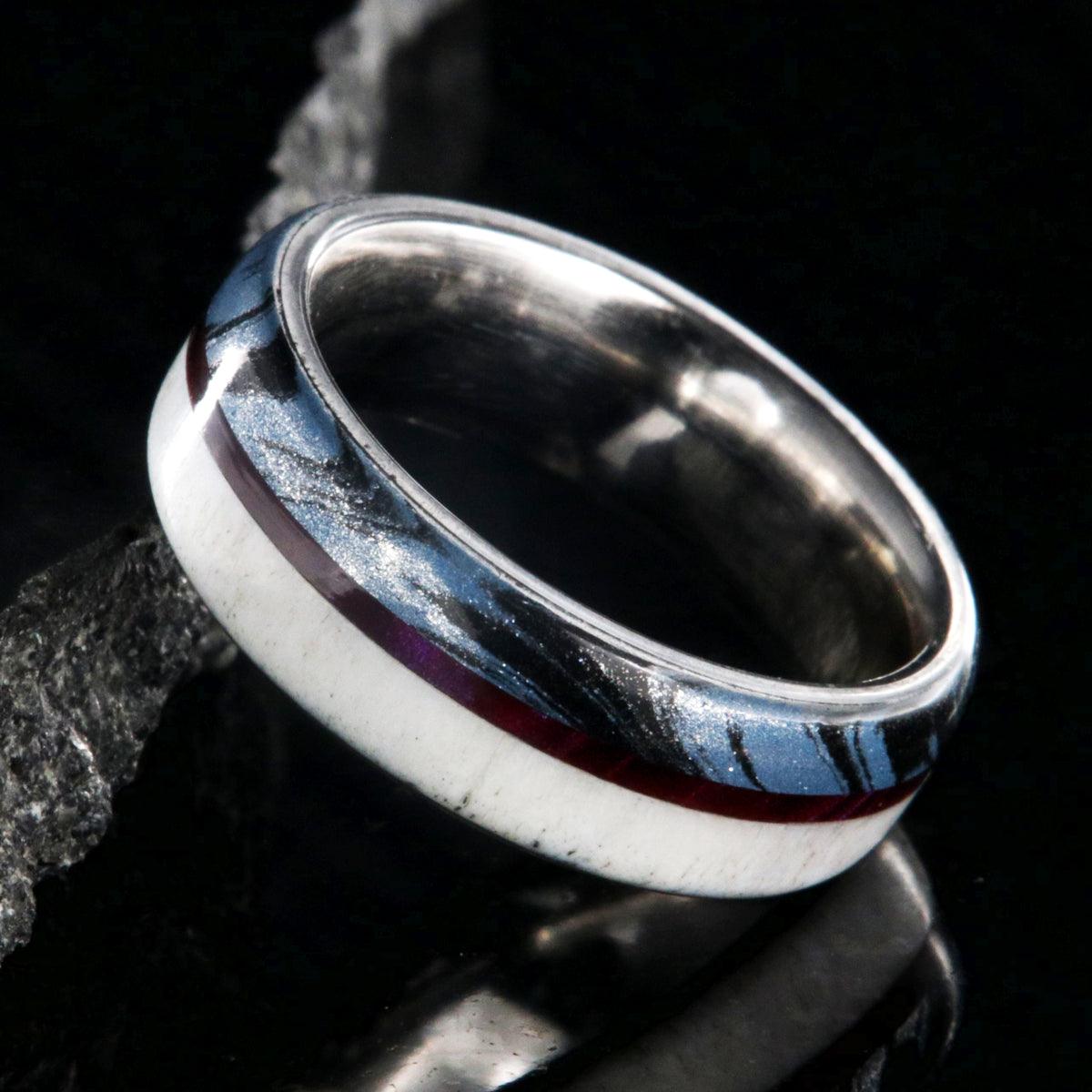 7mm wide wedding band with half antler, half cobaltium mokume, and a maroon pinstripe inlay