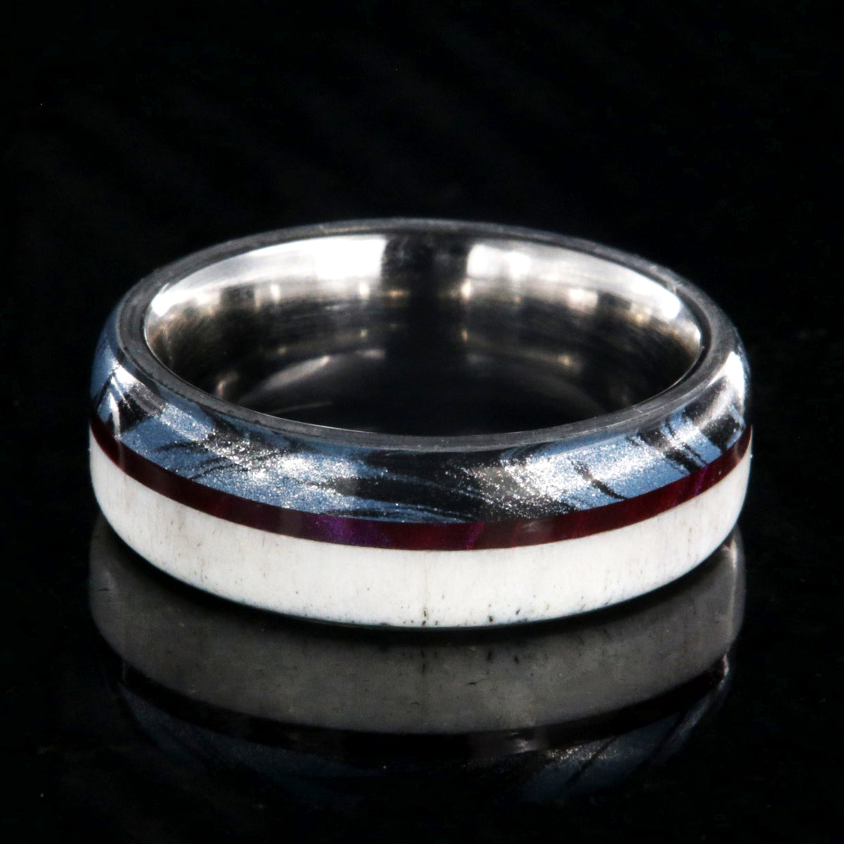 7mm wide wedding band with half antler, half cobaltium mokume, and a maroon pinstripe inlay