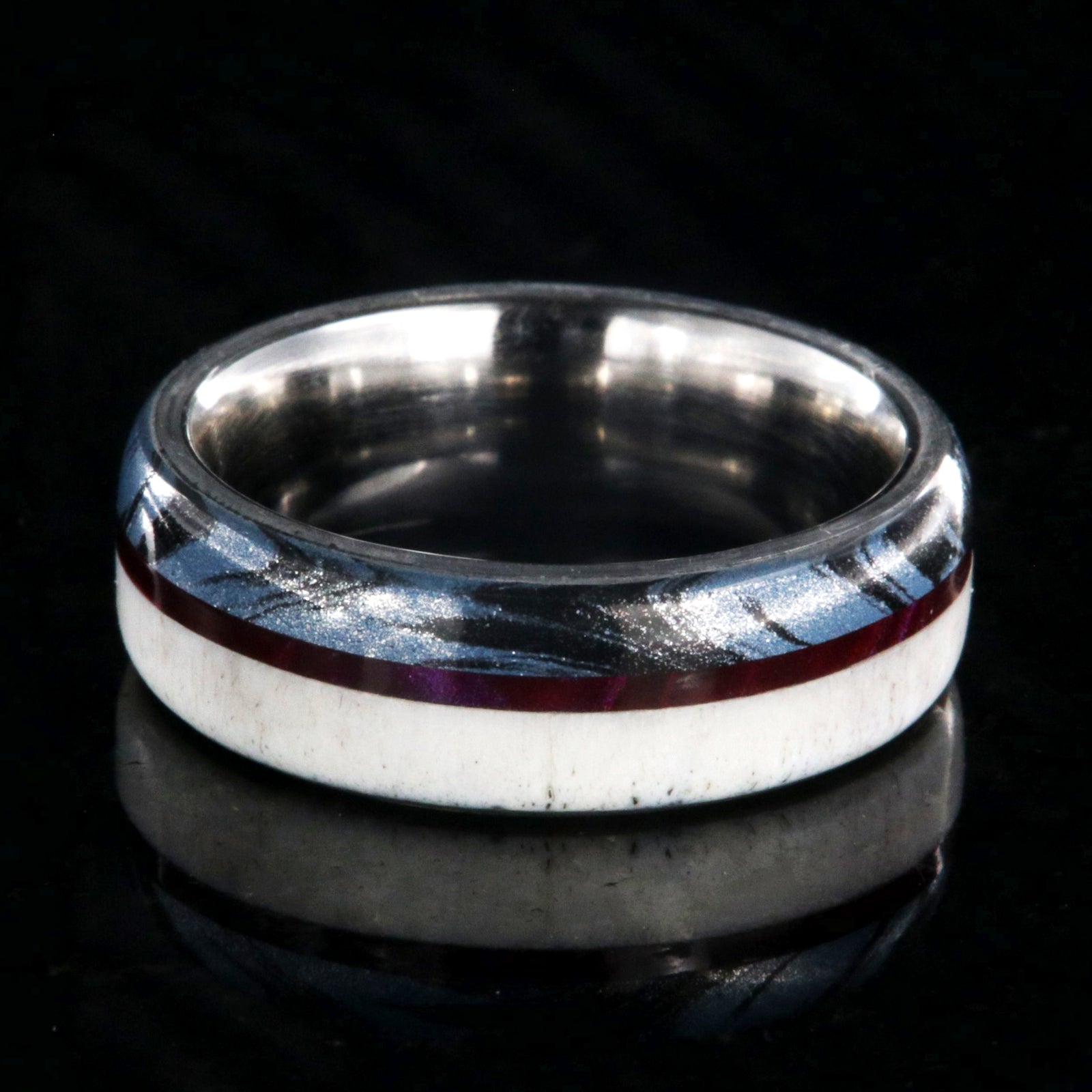 7mm wide wedding band with half antler, half cobaltium mokume, and a maroon pinstripe inlay