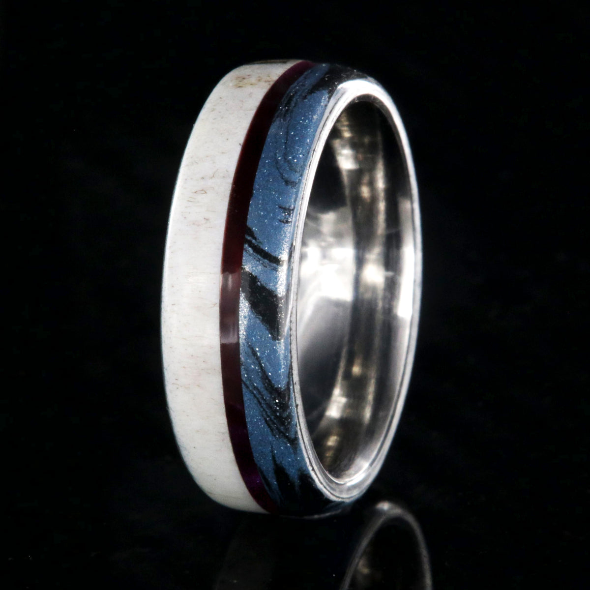 7mm wide wedding band with half antler, half cobaltium mokume, and a maroon pinstripe inlay