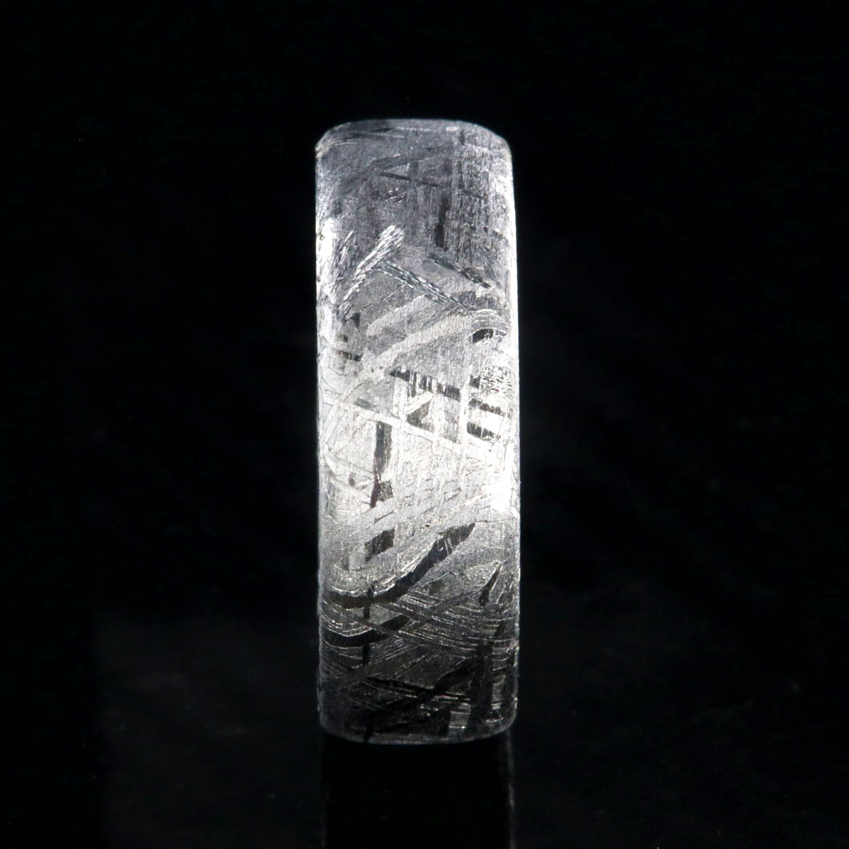 7mm wide Gibeon meteorite wedding band with a cobalt sleeve and rounded profile