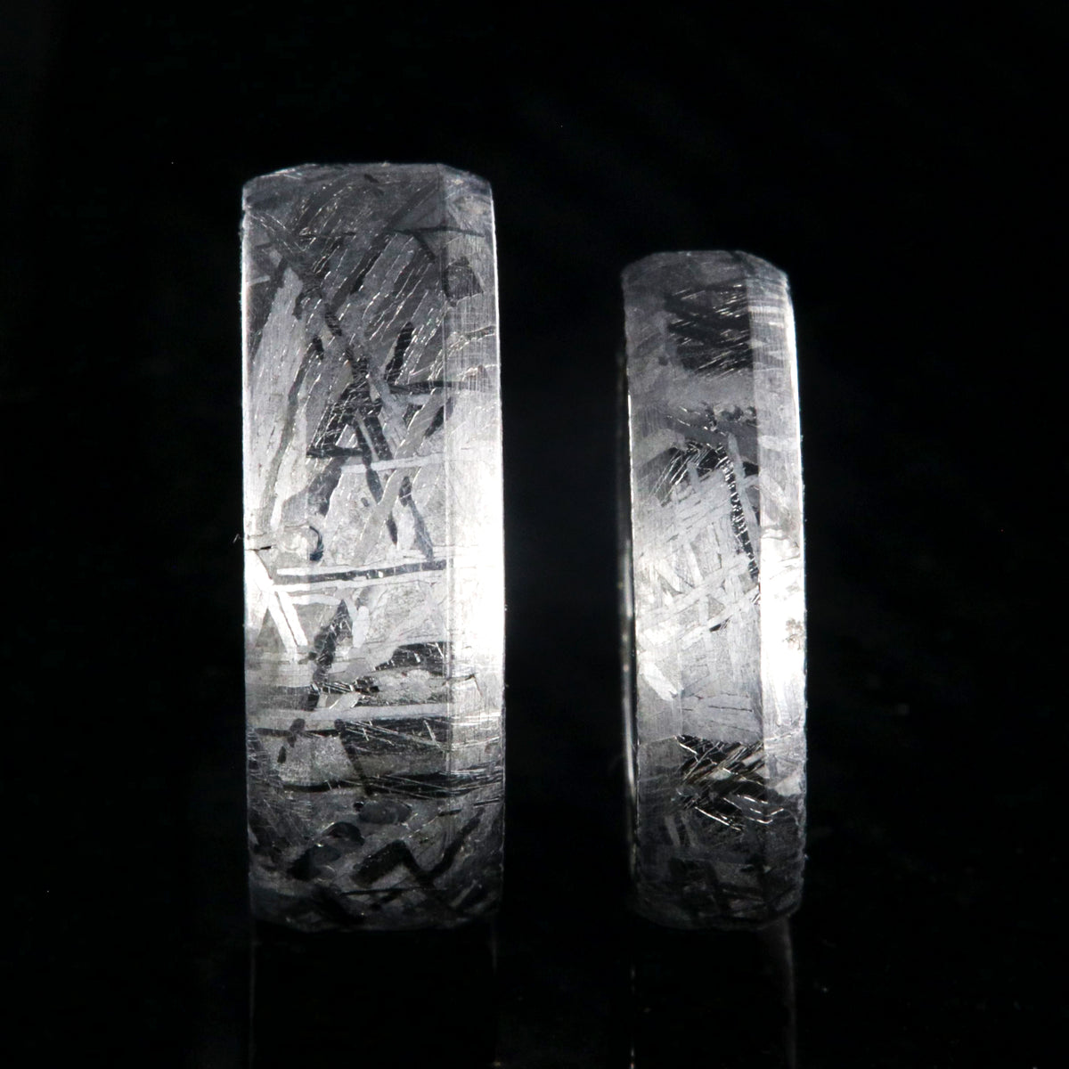 8mm and 5mm matching wedding ring set made with Gibeon meteorite and black titanium sleeves with beveled edges
