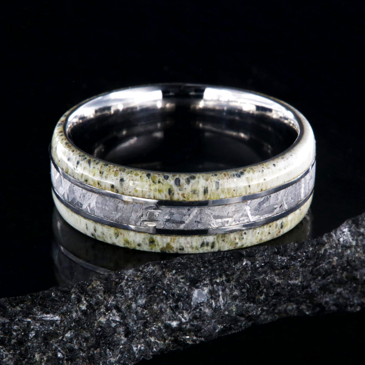 8mm wide men&#39;s ring with a center meteorite inlay and antler edges and cobalt sleeve