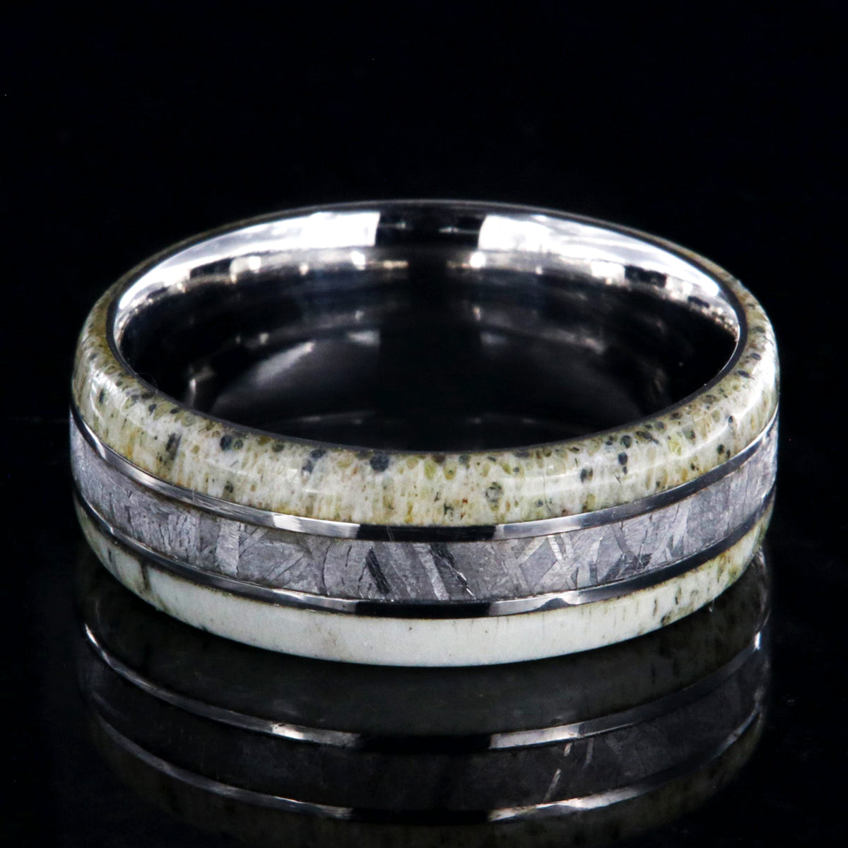 8mm wide men&#39;s ring with a center meteorite inlay and antler edges and cobalt sleeve