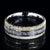 8mm wide men's ring with a center meteorite inlay and antler edges and cobalt sleeve