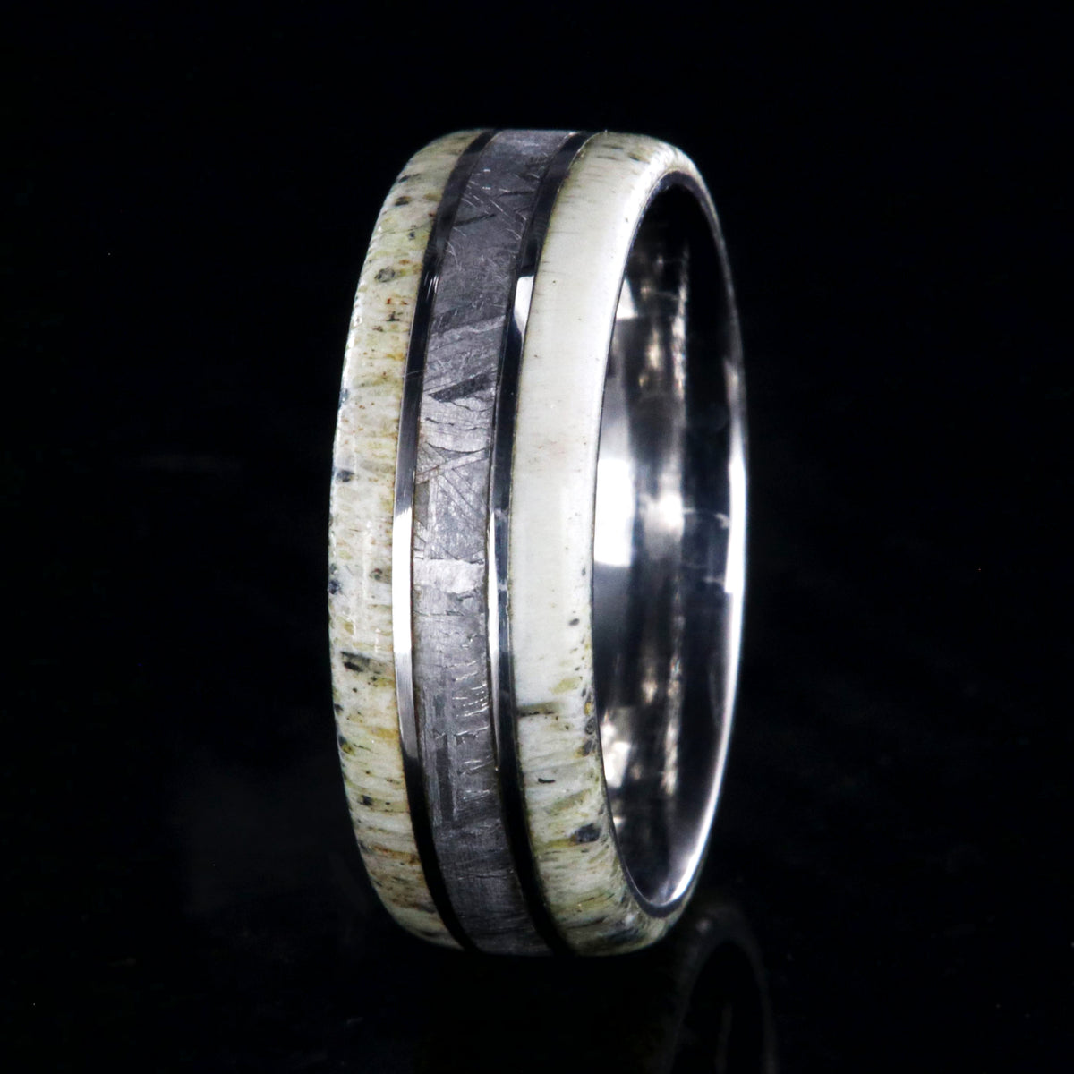 8mm wide men&#39;s ring with a center meteorite inlay and antler edges and cobalt sleeve