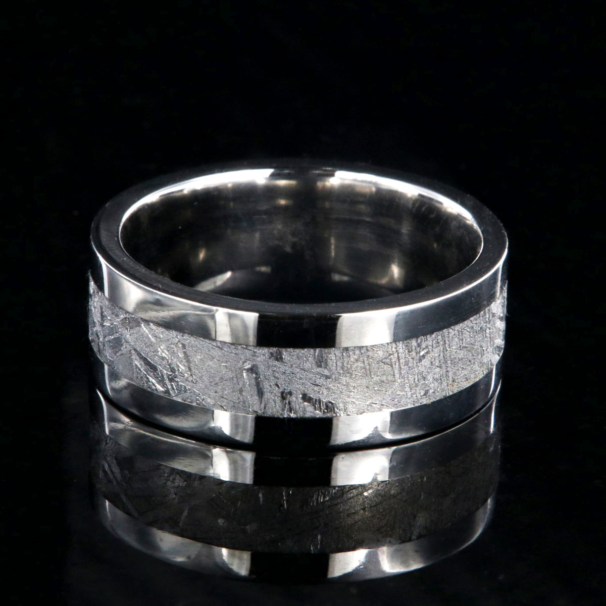 8mm wide men&#39;s wedding ring with a center of Gibeon meteorite and wide polished cobalt edges and sleeve