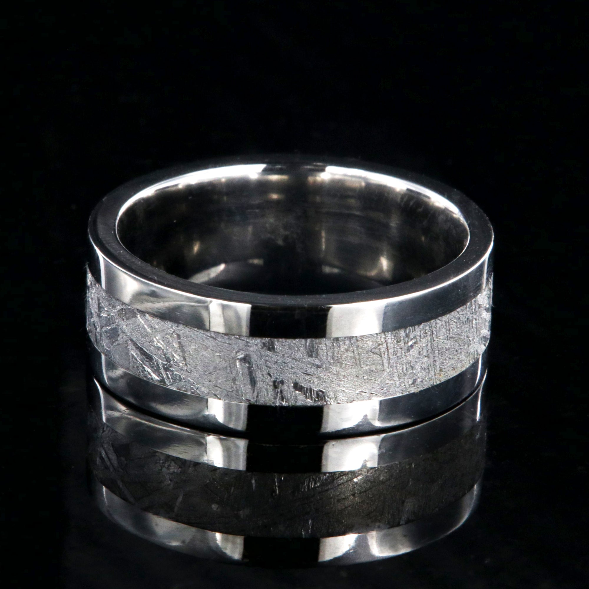 8mm wide men's wedding ring with a center of Gibeon meteorite and wide polished cobalt edges and sleeve