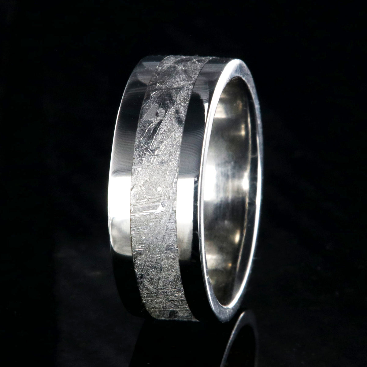 8mm wide men&#39;s wedding ring with a center of Gibeon meteorite and wide polished cobalt edges and sleeve
