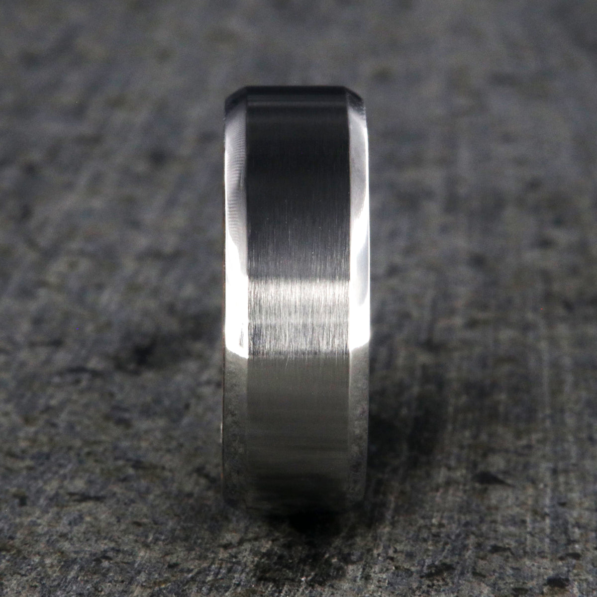 8mm wide cobalt ring with a brushed finish, beveled edges, and a whiskey barrel sleeve