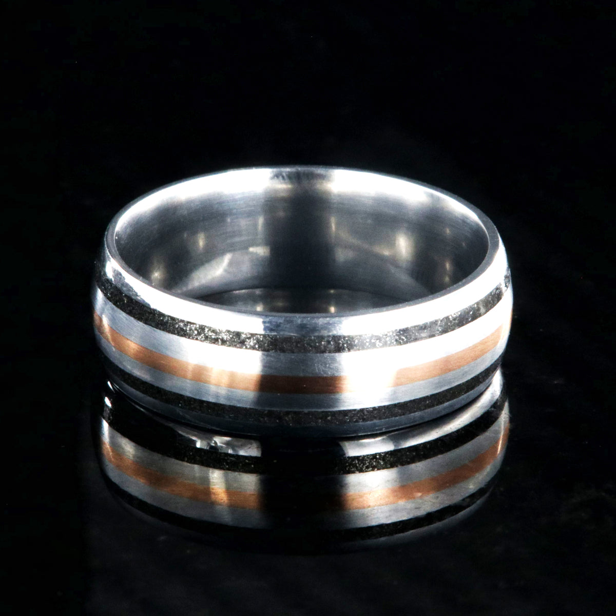 8mm wide cobalt wedding ring with dual stardust edge inlays and one center rose gold inlay