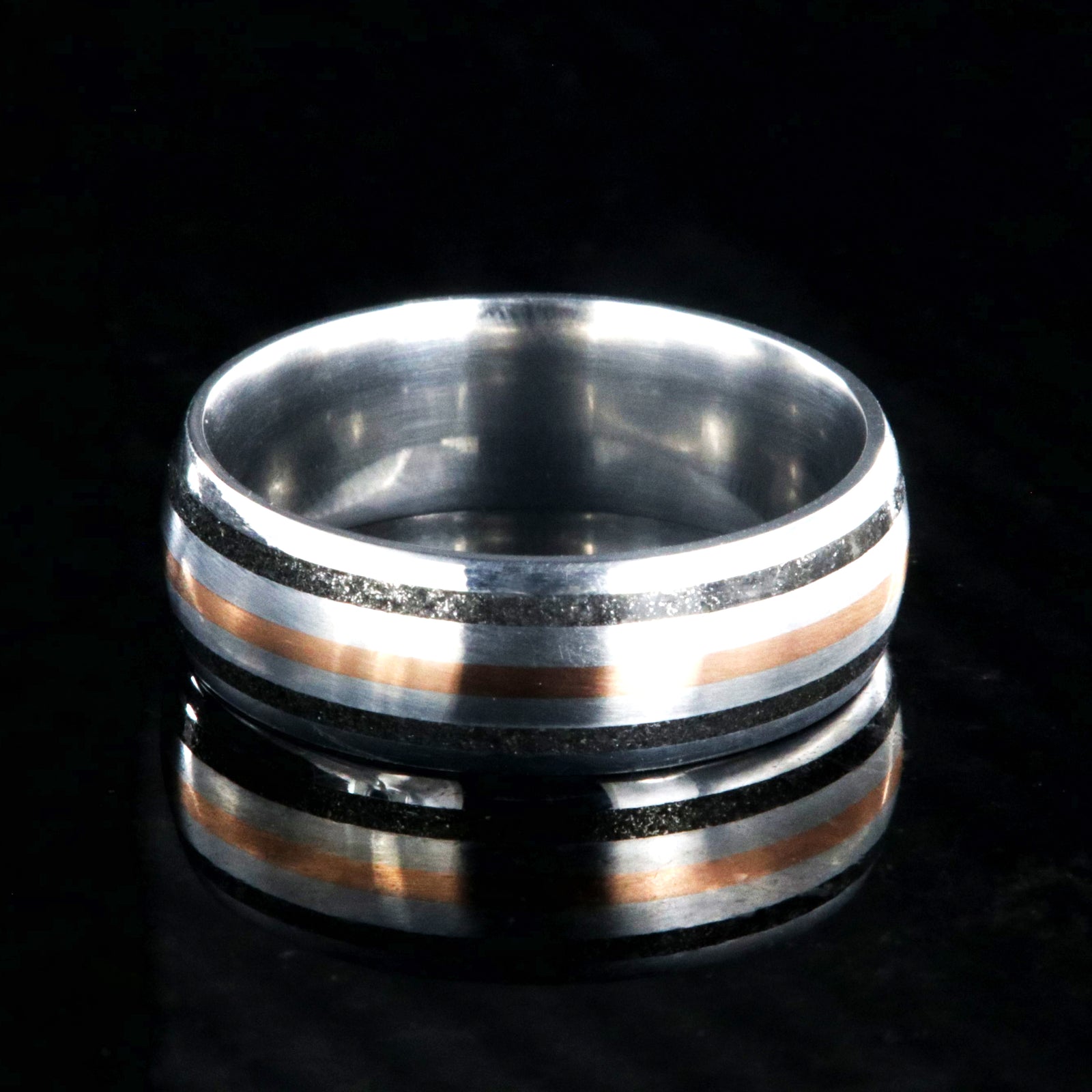 8mm wide cobalt wedding ring with dual stardust edge inlays and one center rose gold inlay