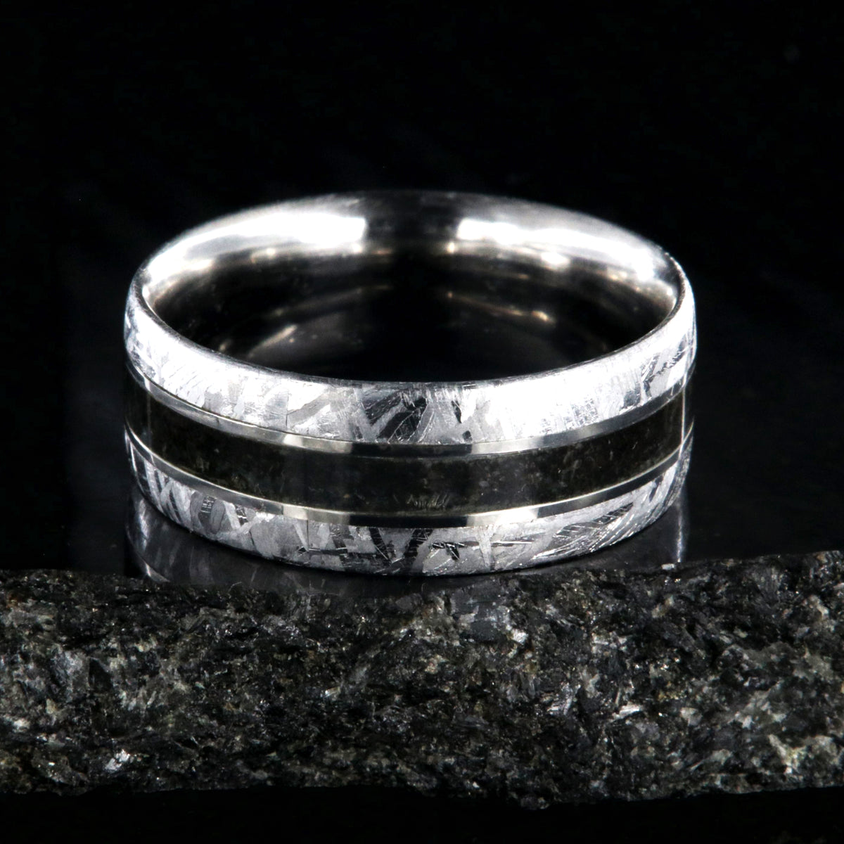 8mm wide cobalt ring with meteorite edges and dinosaur bone center inlay