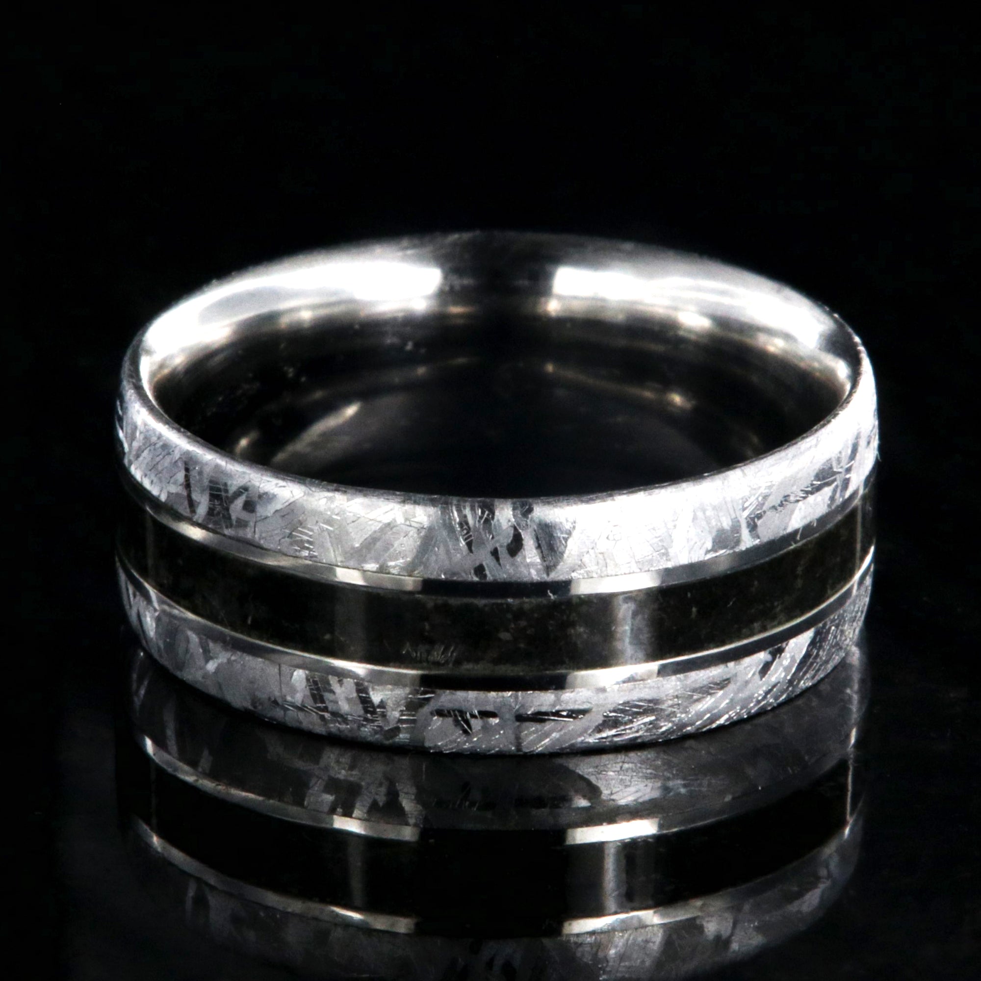 8mm wide cobalt ring with meteorite edges and dinosaur bone center inlay